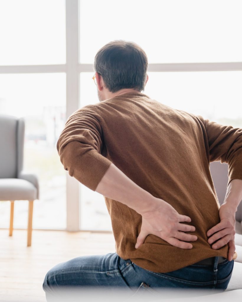 Pain in back spine vertebrae problems, sedentary lifestyle. Healthcare and medicine.